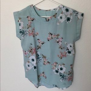 Pretty light blue flowery blouse